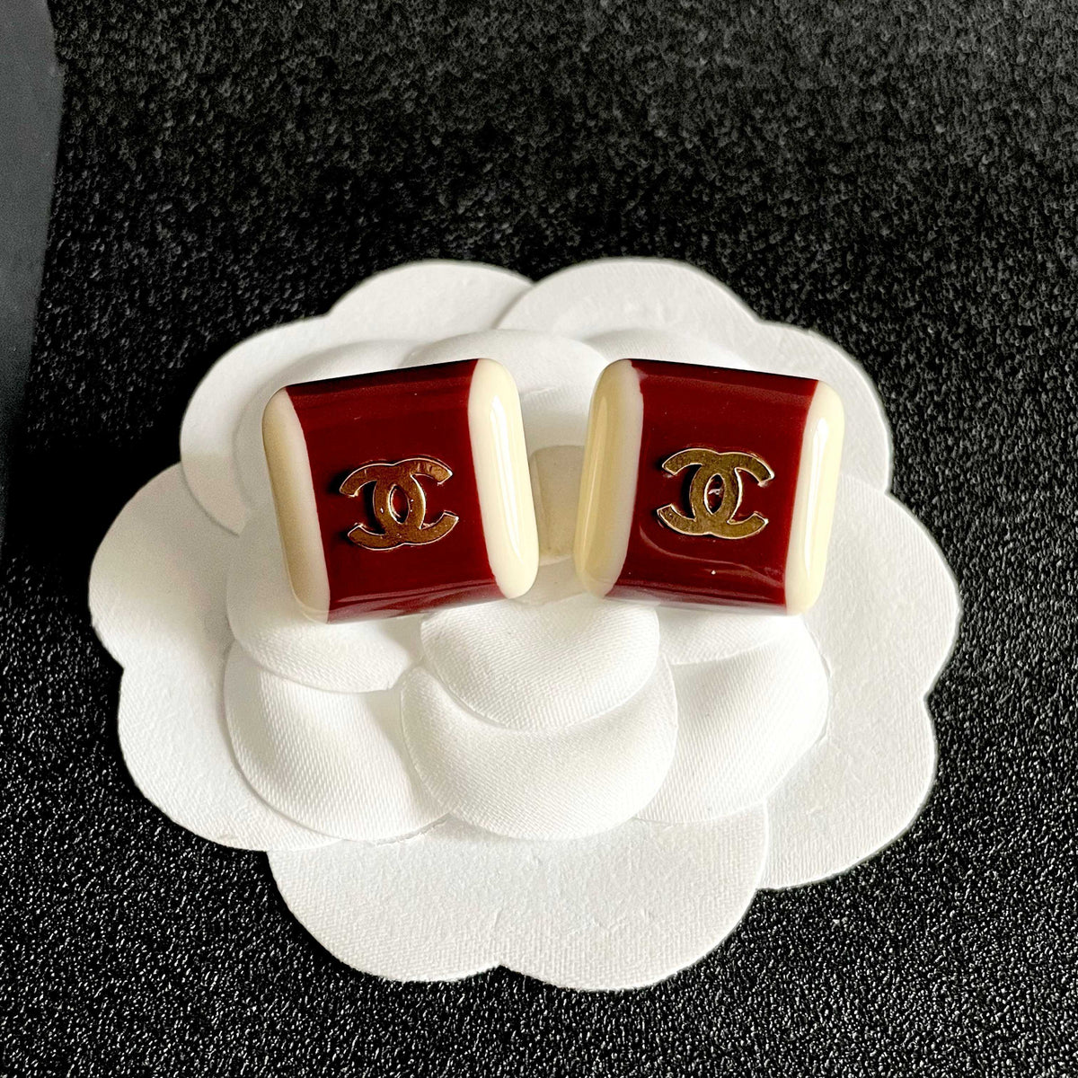 Double-C Emblem Stud Earrings in Polished Metal-Tone – Design 091 front product view