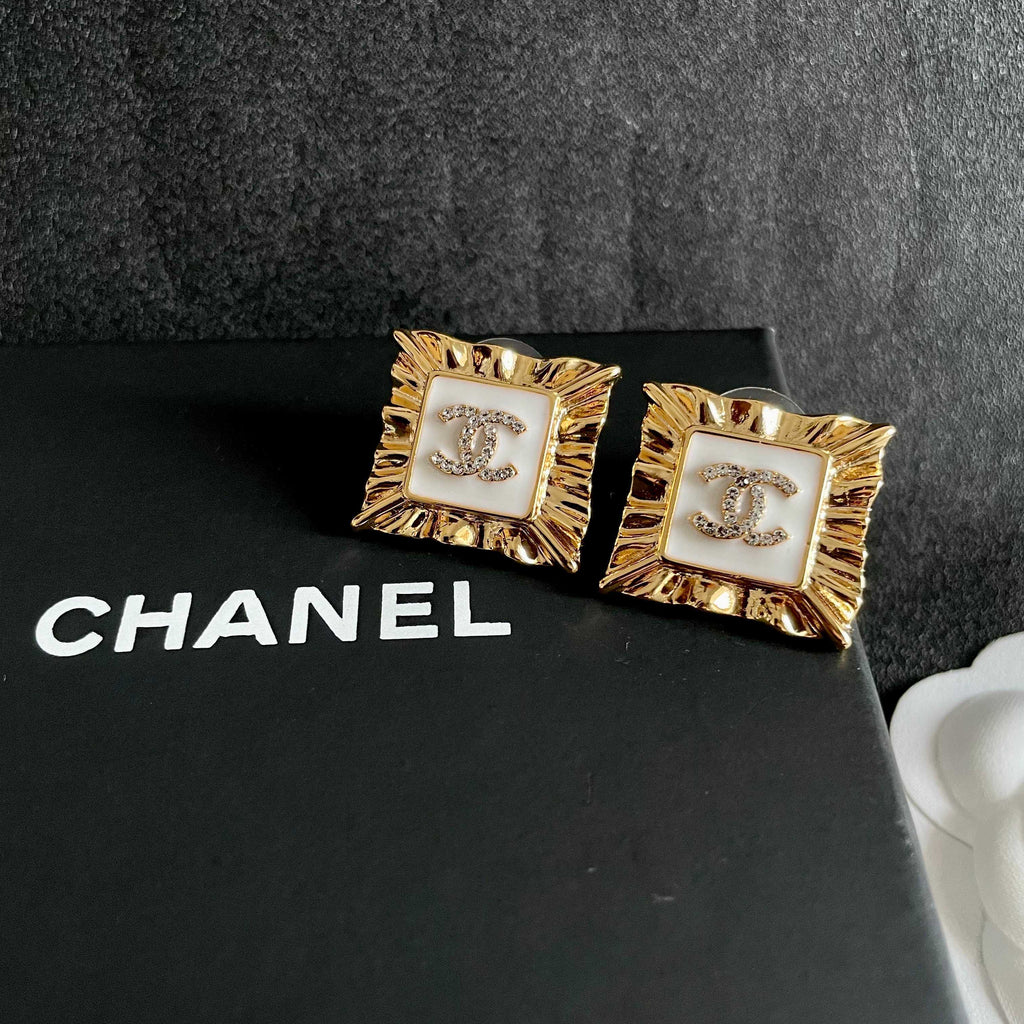 Double-C Emblem Stud Earrings in Polished Metal-Tone – Design 085 detail view