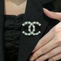 Signature Emblem Brooch in Polished Metal-Tone – Design 013 main product view