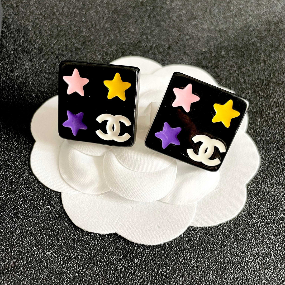 Double-C Emblem Stud Earrings in Polished Metal-Tone – Star Detail – Design 004 front product view