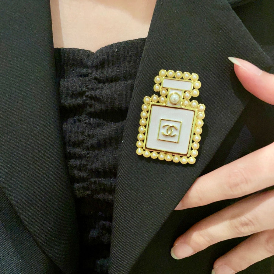 Double-C Emblem Brooch in Polished Metal-Tone – Pearl Detail main product view