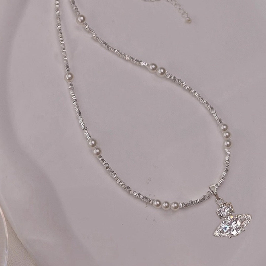 Orb Pendant Necklace in Polished Metal-Tone – Pearl Detail side detail