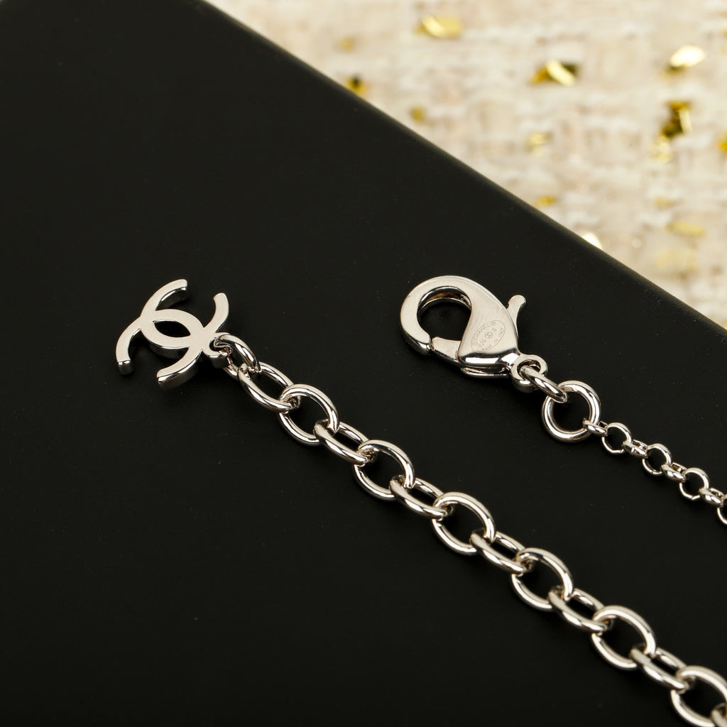 Double-C Emblem Pendant Necklace in Silver-Tone – White Detail close-up detail