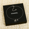 Double-C Emblem Pendant Necklace in Silver-Tone – White Detail main product view