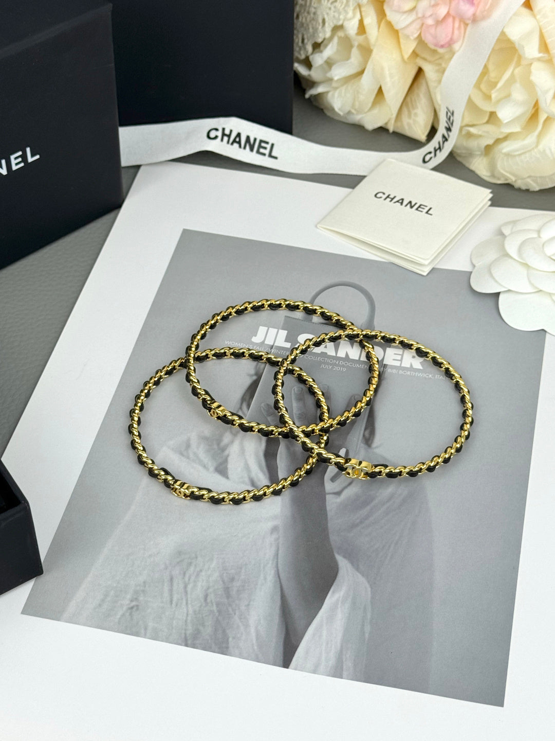 Signature Emblem Bangle in Black-Tone side detail