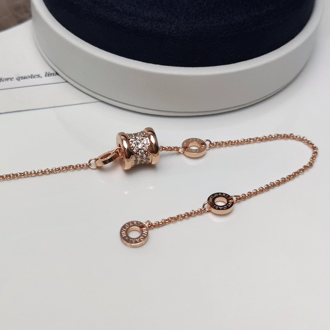 Geometric Emblem Bracelet in Rose-Gold-Tone close-up detail