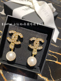 Double-C Emblem Pearl-Detail Stud Earrings – Pearl Detail – Design 015 main product view