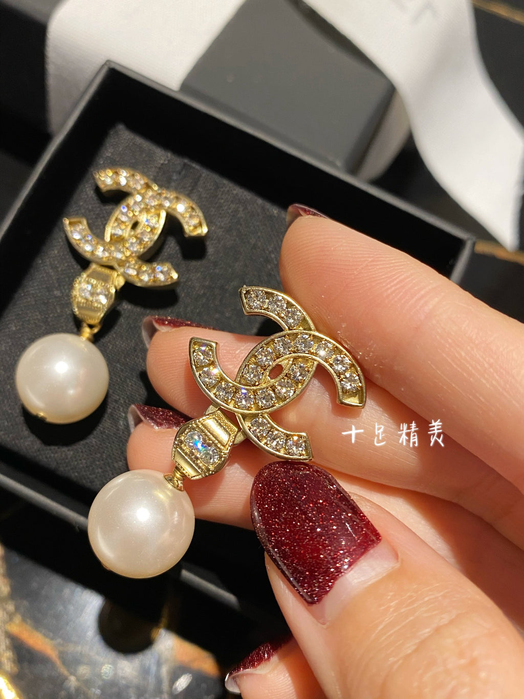 Double-C Emblem Pearl-Detail Stud Earrings – Pearl Detail – Design 015 close-up detail