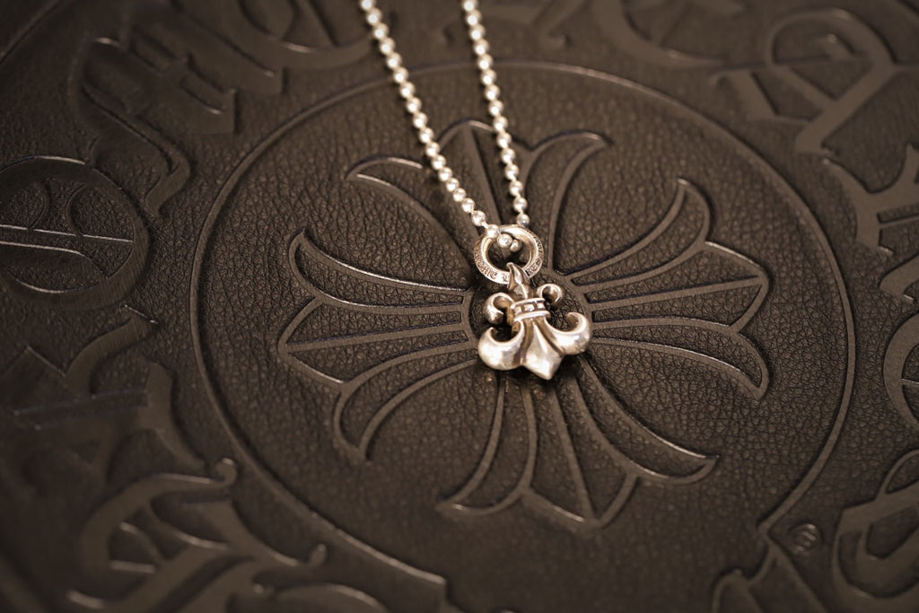 Fleur-de-Lis Pendant in Metal-Tone close-up detail