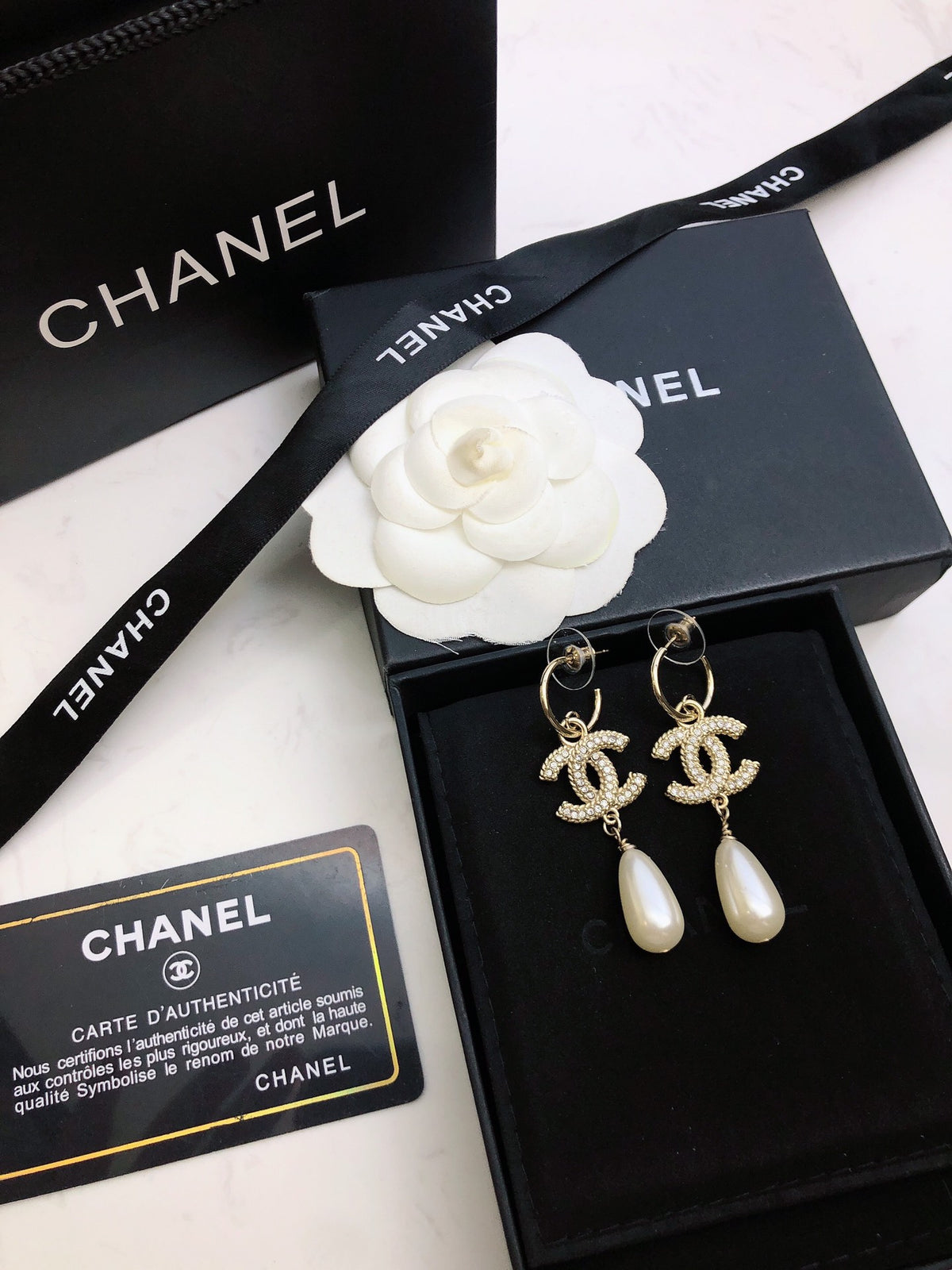 Signature Emblem Stud Earrings in Polished Metal-Tone – Design 091 detail view