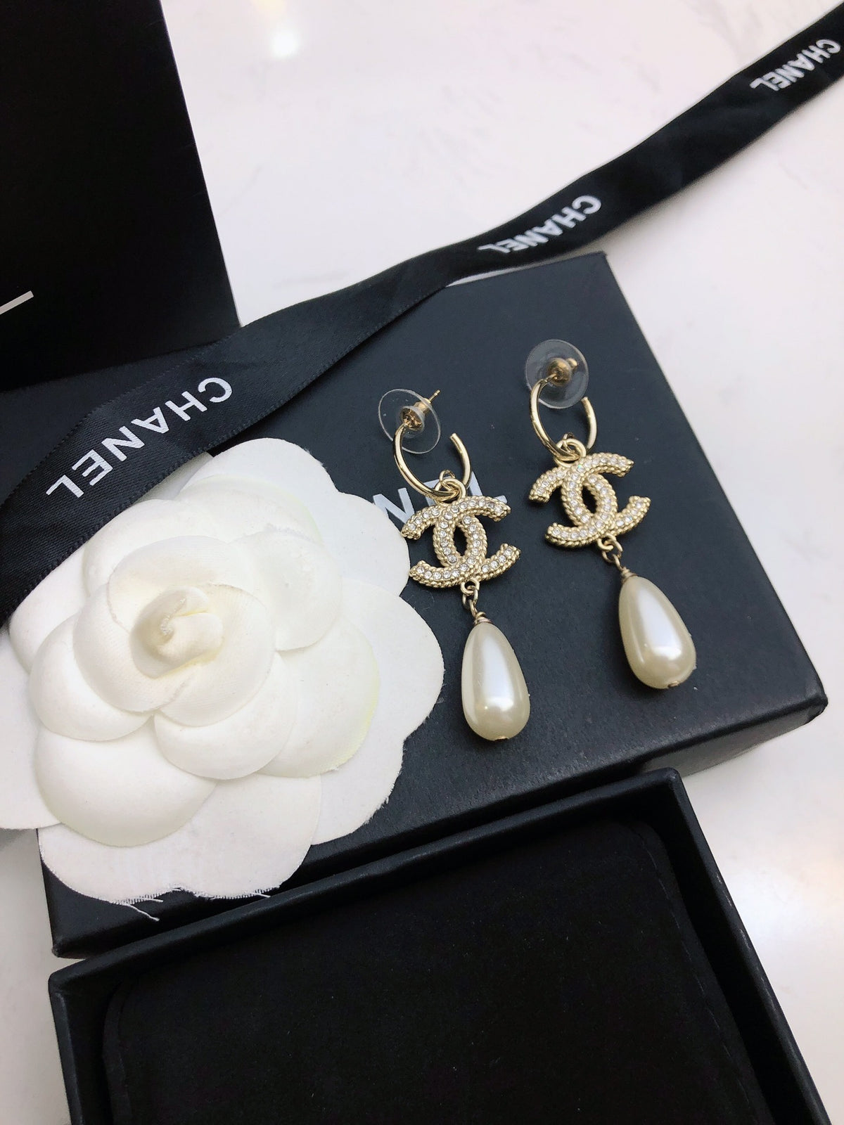 Signature Emblem Stud Earrings in Polished Metal-Tone – Design 109 styled product view
