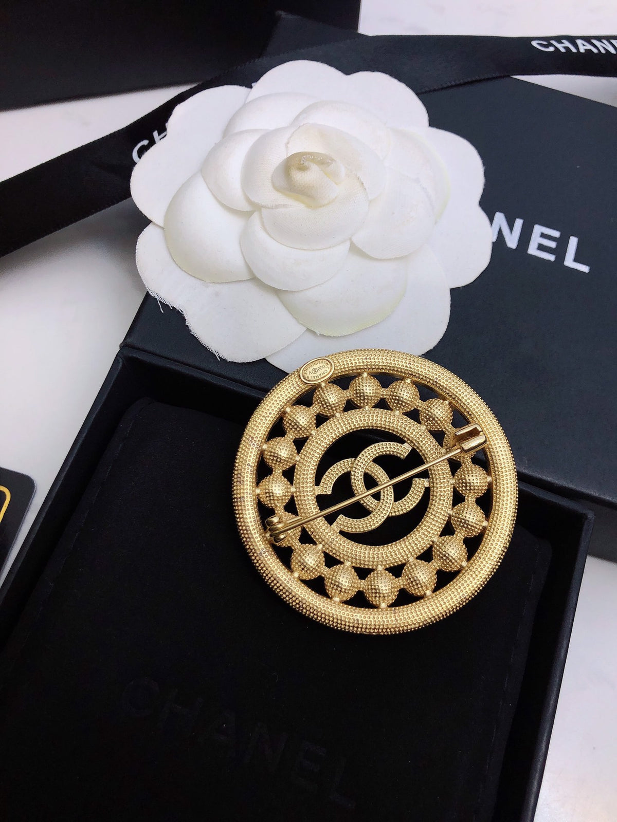 Signature Emblem Brooch in Polished Metal-Tone – Design 035 detail view