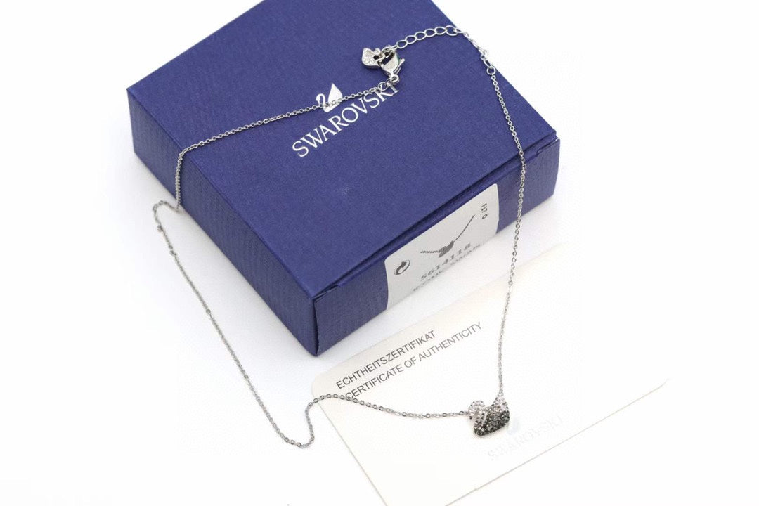 Swan Pendant Necklace in Gold-Tone – Black Detail front product view