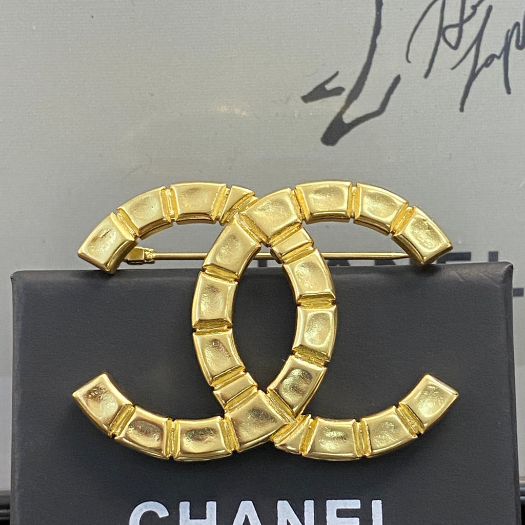 Double-C Emblem Brooch in Polished Metal-Tone – Design 006 detail view