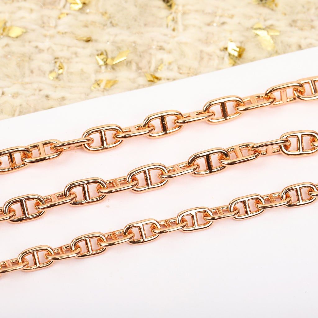 Signature Emblem Bracelet in Gold-Tone – Red Detail – Design 002 close-up detail