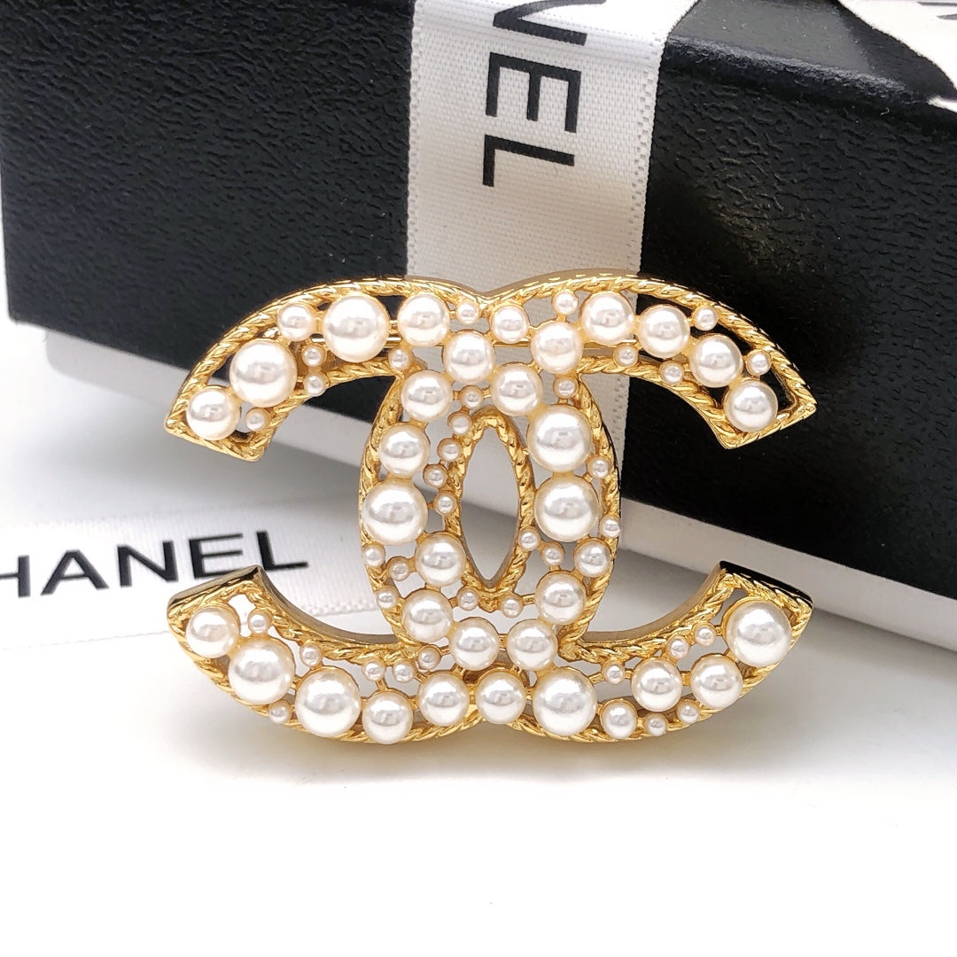 Double-C Emblem Brooch in Gold-Tone – Pearl Detail main product view