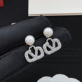 Signature Emblem Pearl-Detail Stud Earrings – Design 05 main product view