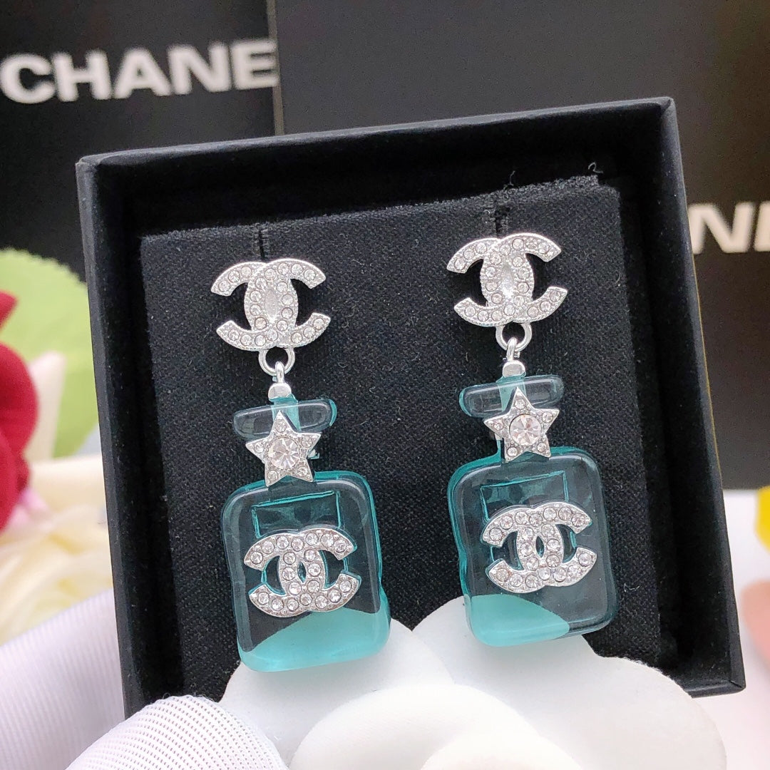Signature Emblem Stud Earrings in Gold-Tone – Blue Detail – Design 002 close-up detail