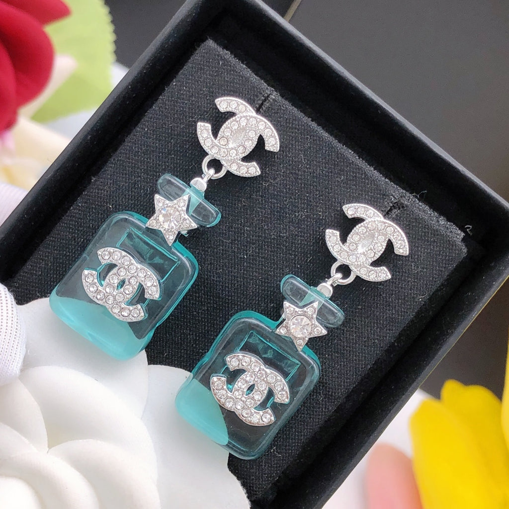Signature Emblem Stud Earrings in Gold-Tone – Blue Detail – Design 002 styled product view