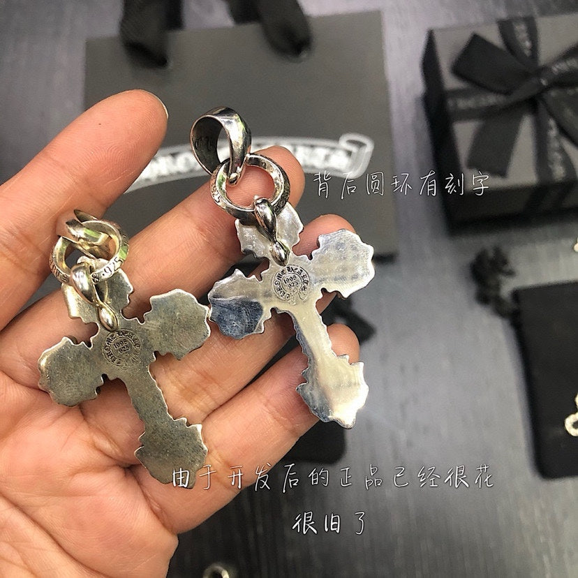 Cross Pendant Necklace in Metal-Tone – Flame Detail front product view