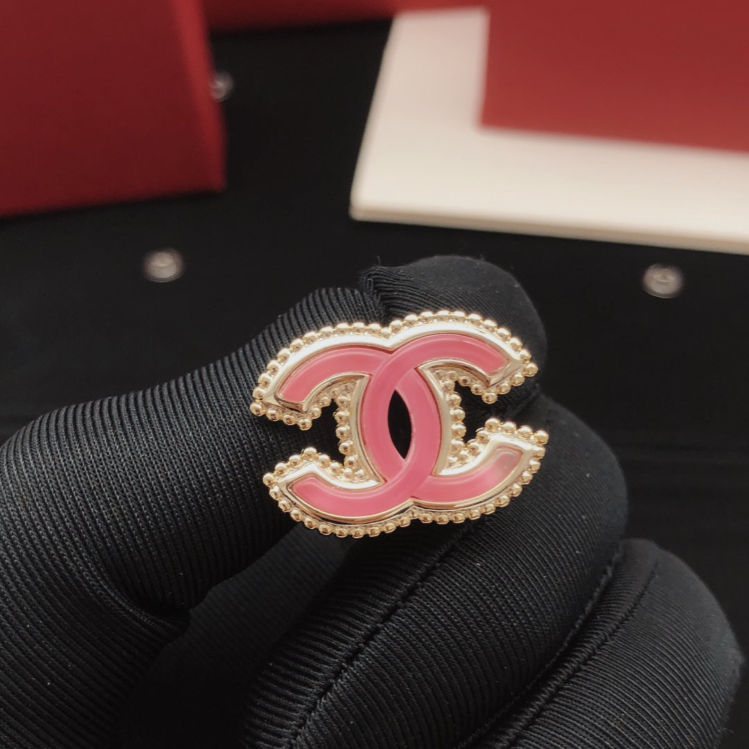Double-C Emblem Stud Earrings in Gold-Tone – Pink Detail styled product view
