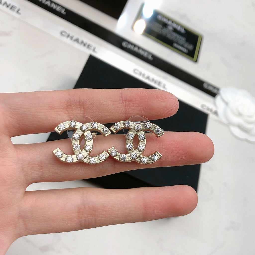 Heart Stud Earrings in Polished Metal-Tone – Heart Detail – Design 003 styled product view