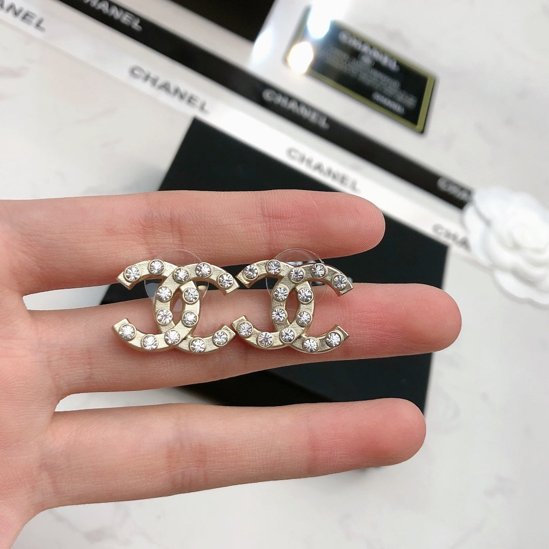 Heart Stud Earrings in Polished Metal-Tone – Heart Detail – Design 005 styled product view