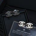 Double-C Emblem Stud Earrings in Polished Metal-Tone – Design 202 main product view