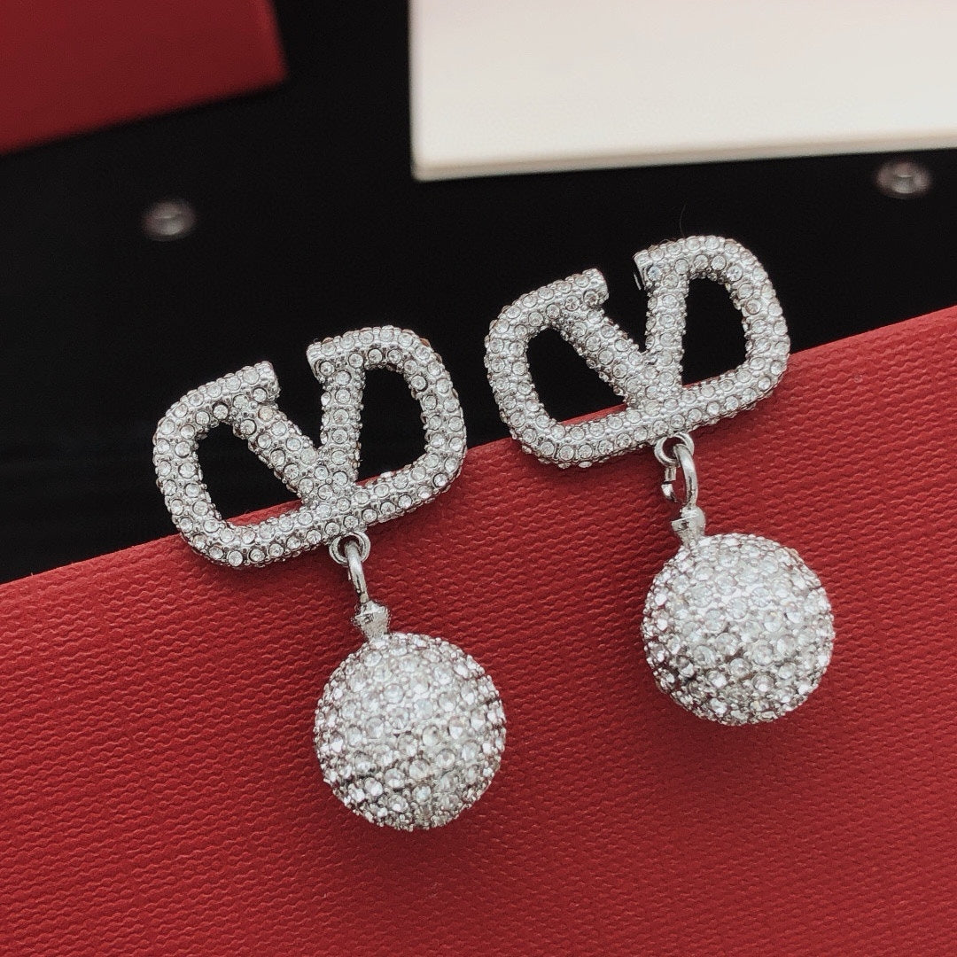 Signature Emblem Crystal-Accent Stud Earrings – Design 01 front view