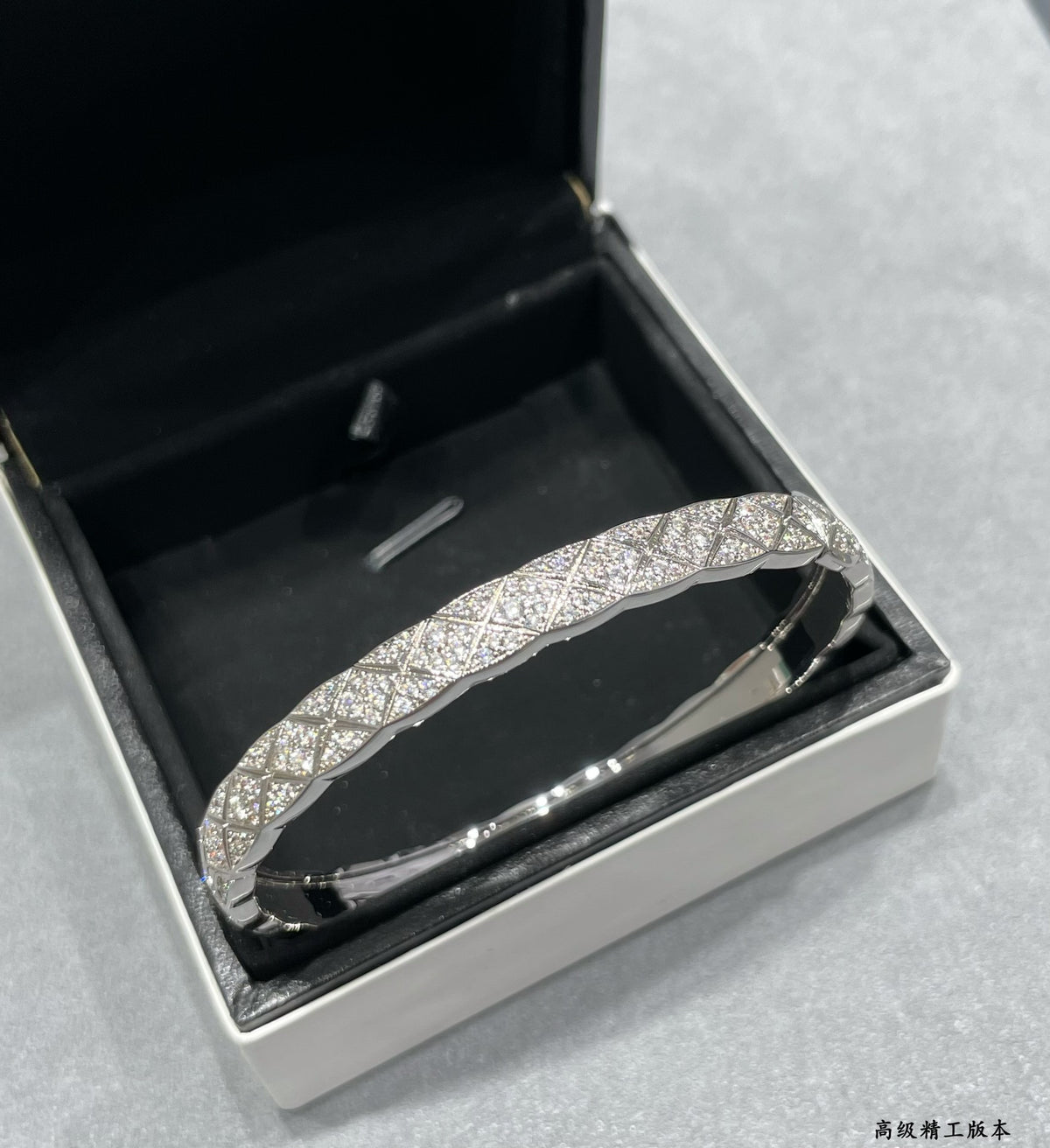 Signature Emblem Bangle in Polished Metal-Tone – Design 038 detail view