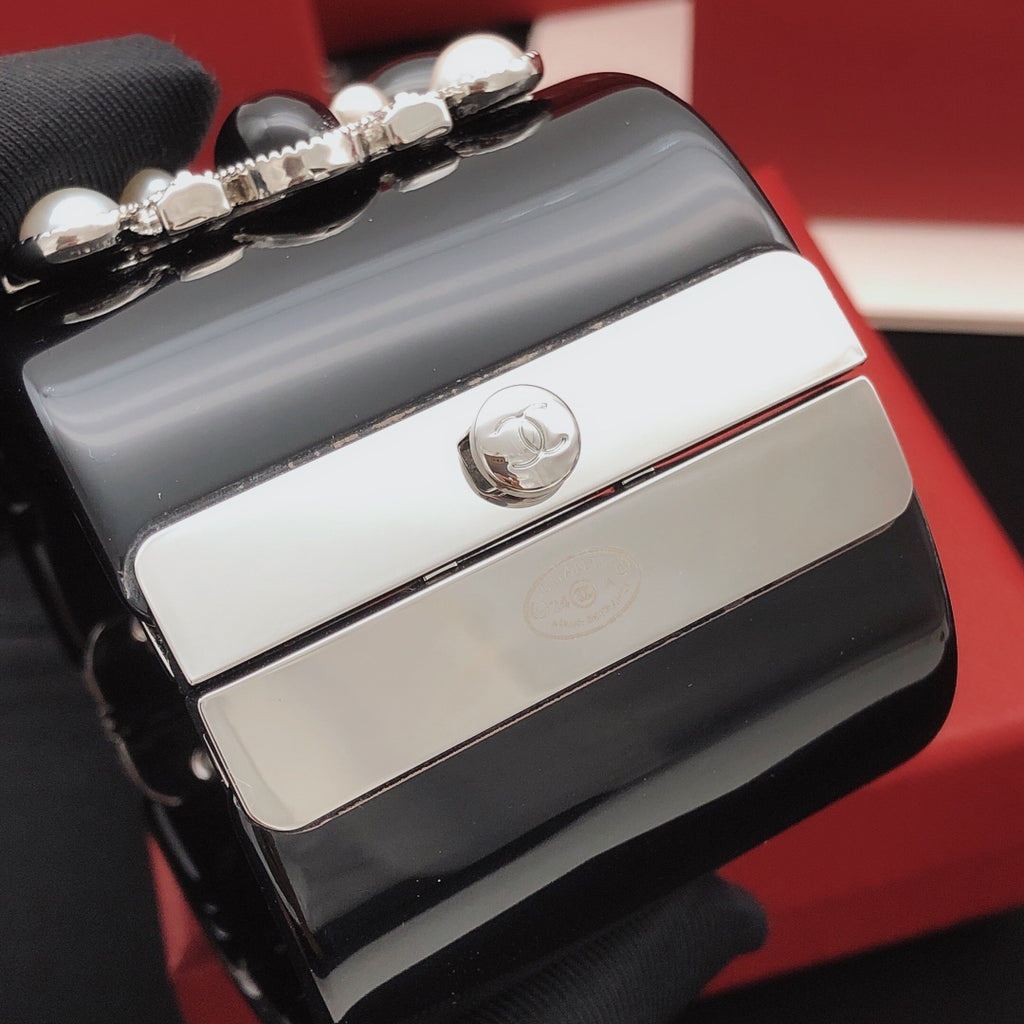 Signature Emblem Bangle in Gold-Tone – Black Detail styled product view