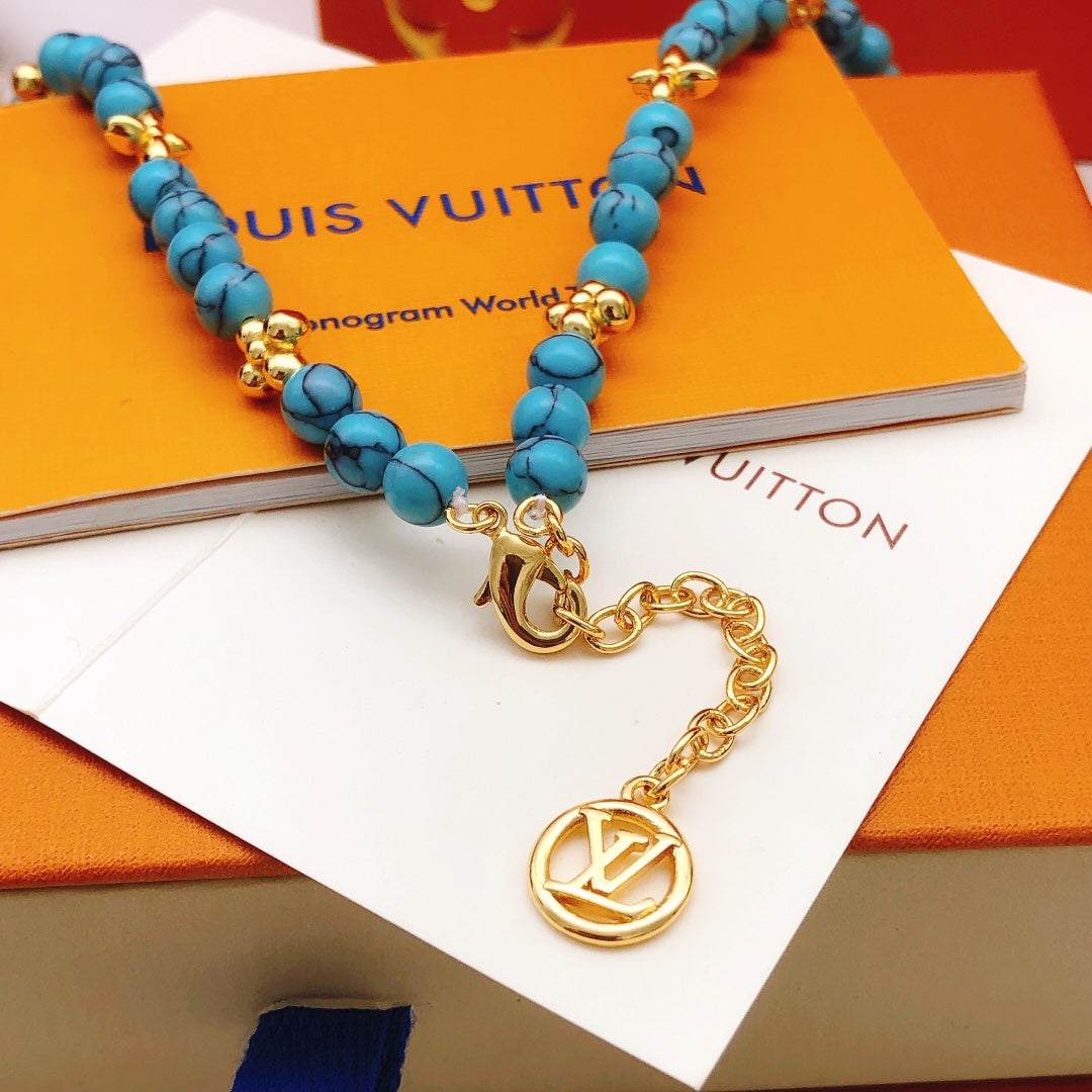 Geometric Emblem Pendant Necklace in Gold-Tone – Blue Detail – Design 007 detail view