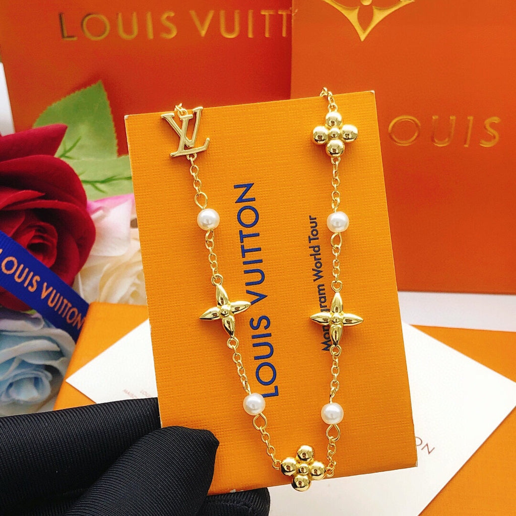 Floral Pendant Necklace in Gold-Tone – Pearl Detail close-up detail