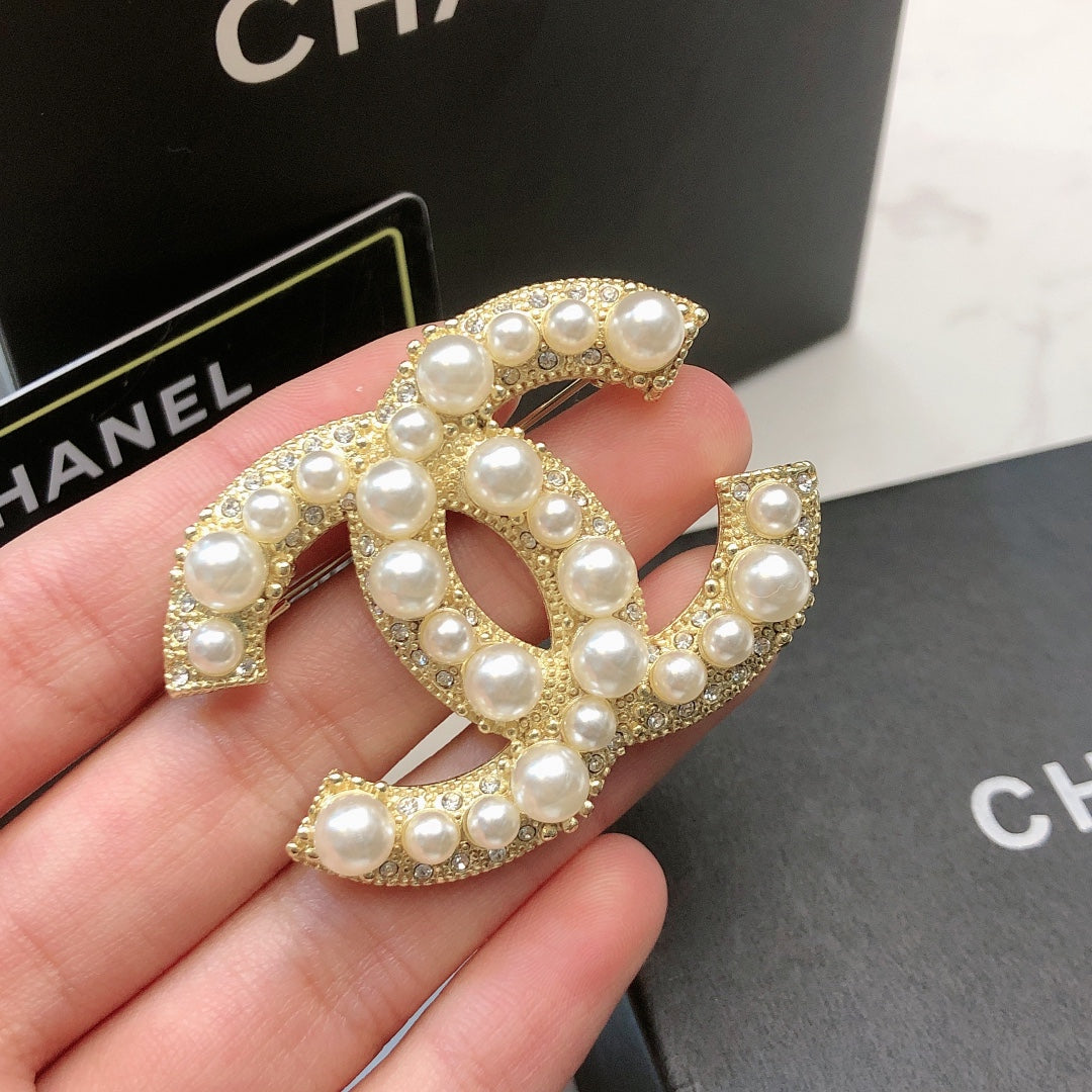 Signature Emblem Brooch in Polished Metal-Tone – Design 038 front product view