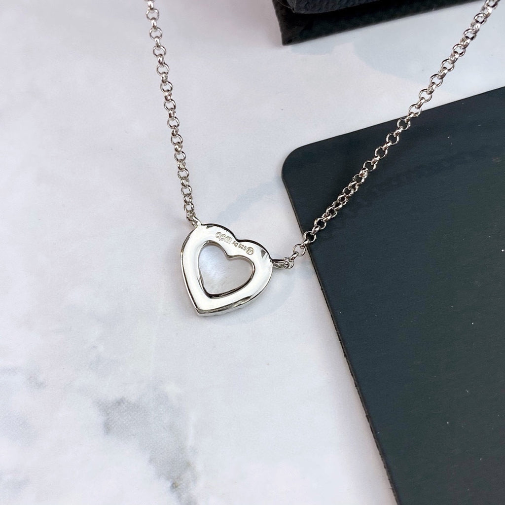 Adjustable Heart Pendant Necklace in Polished Metal-Tone close-up detail