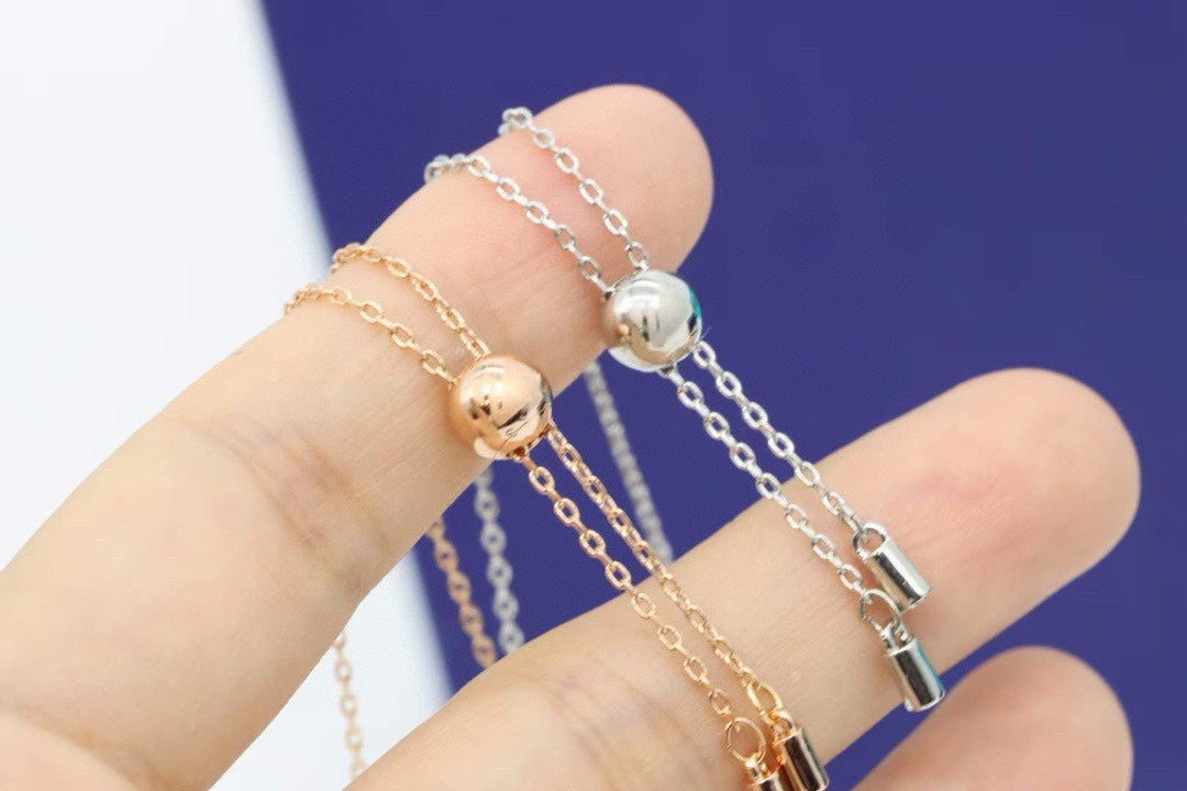 Interlocking Ring Adjustable Bracelet in Rose-Gold-Tone styled product view