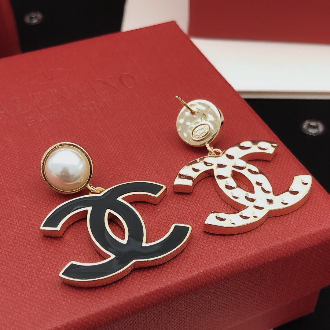 Signature Emblem Stud Earrings in Gold-Tone – Black Detail – Design 002 detail view