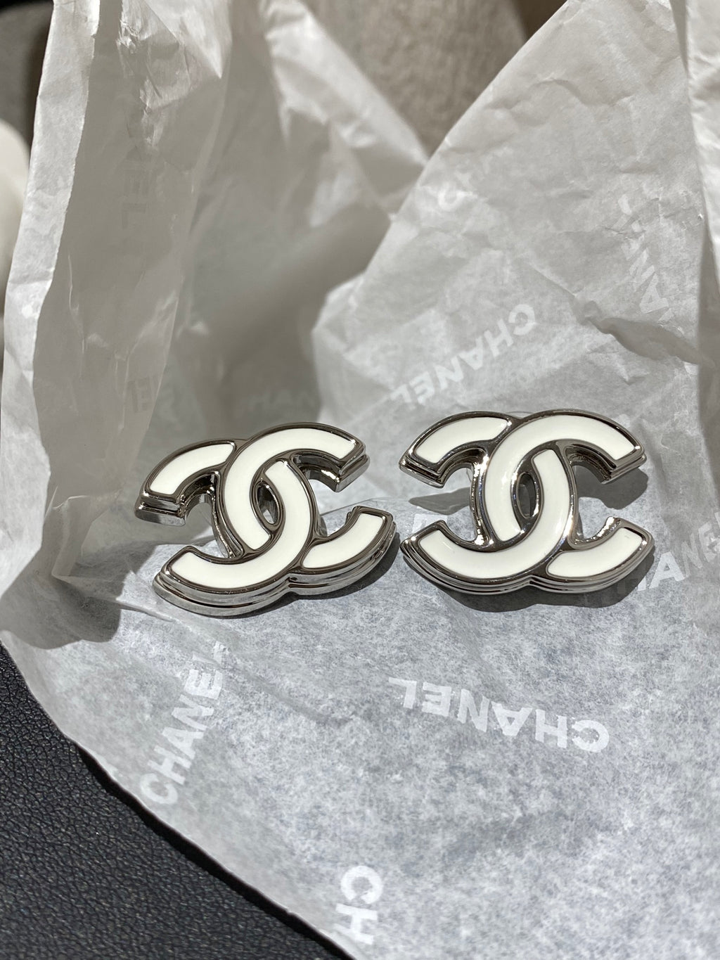 Double-C Emblem Stud Earrings in Polished Metal-Tone – White Detail – Design 004 main product view