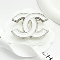 Double-C Emblem Brooch in Polished Metal-Tone – White Detail main product view