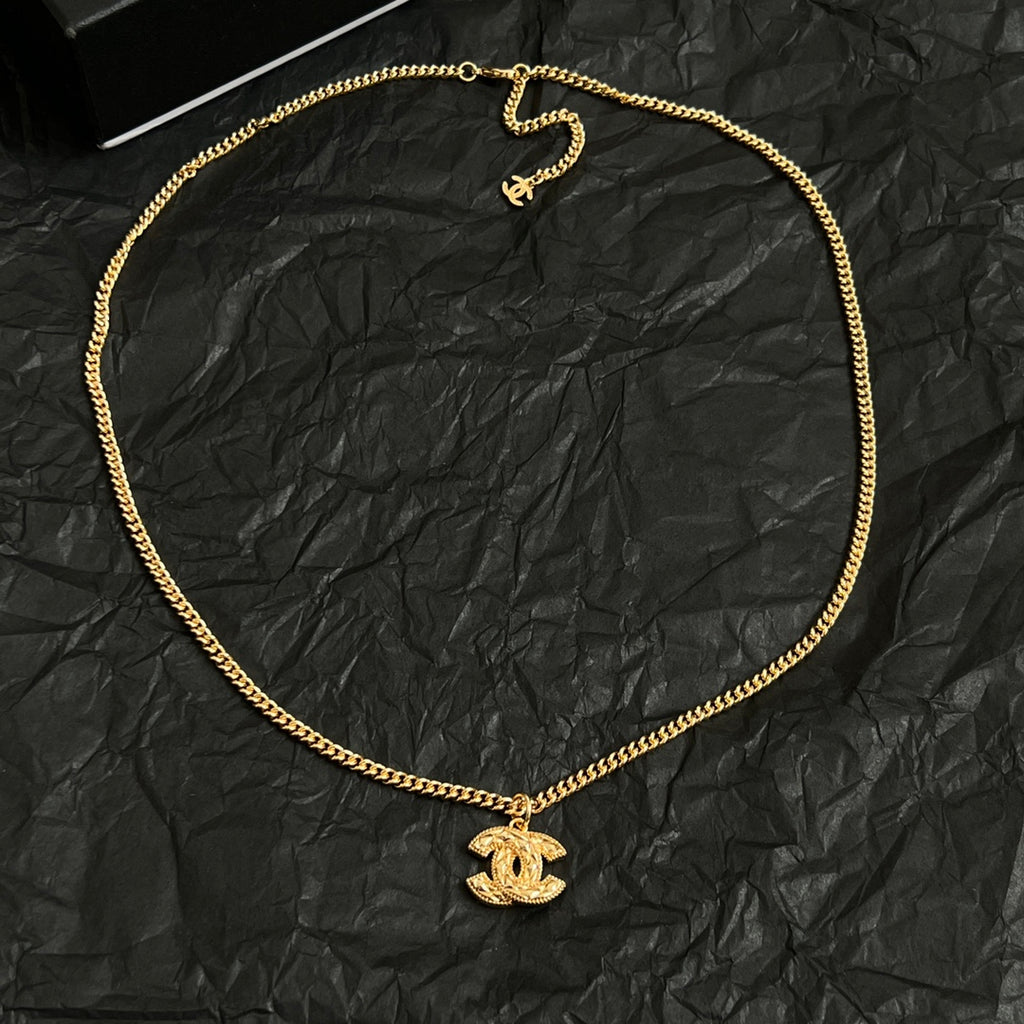 Double-C Emblem Pendant Necklace in Polished Metal-Tone – Design 063 close-up detail