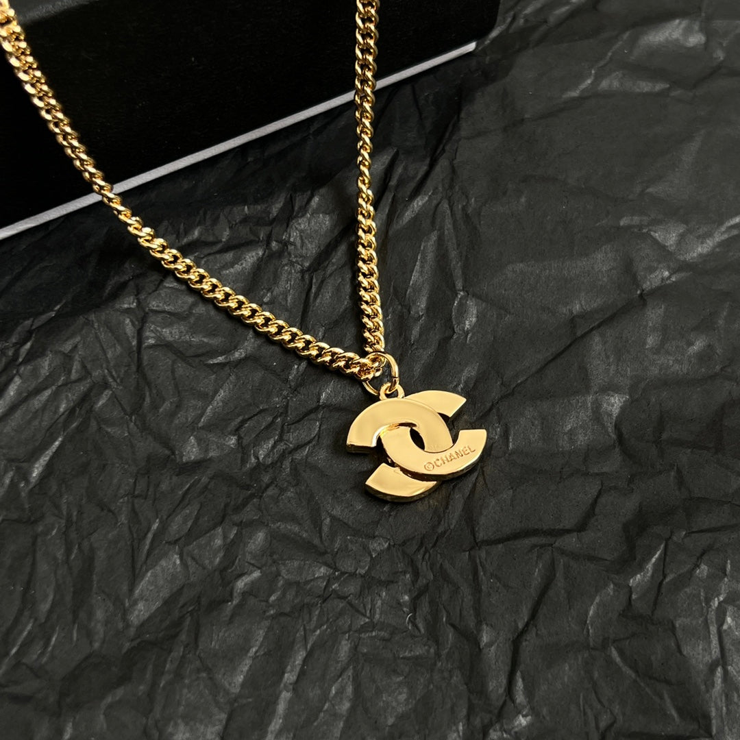 Double-C Emblem Pendant Necklace in Polished Metal-Tone – Design 063 styled product view