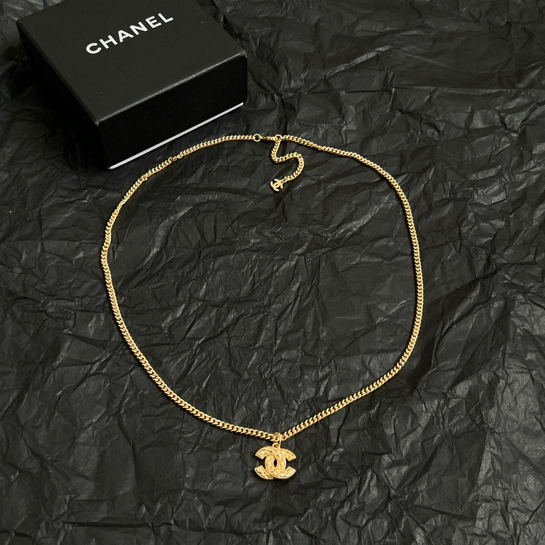 Double-C Emblem Pendant Necklace in Polished Metal-Tone – Design 063 detail view