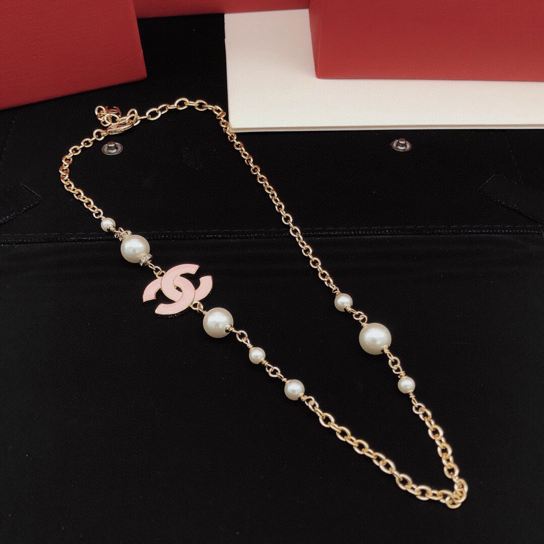 Signature Emblem Pendant Necklace in Gold-Tone – Pink Detail – Design 005 main product view