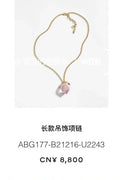 Signature Emblem Pendant Necklace in Polished Metal-Tone – Pink Detail main product view