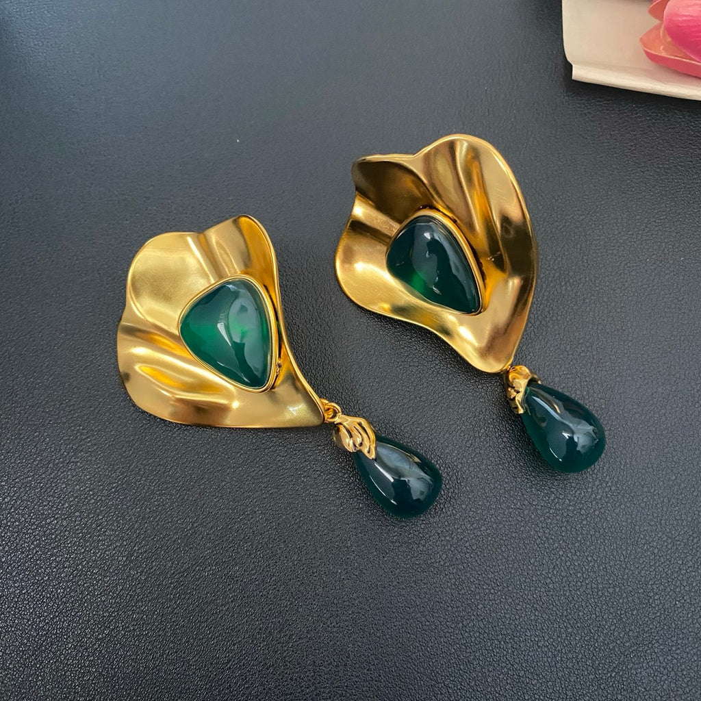 Saint Laurent Fan Clip-On Earrings in Polished Metal-Tone close-up detail