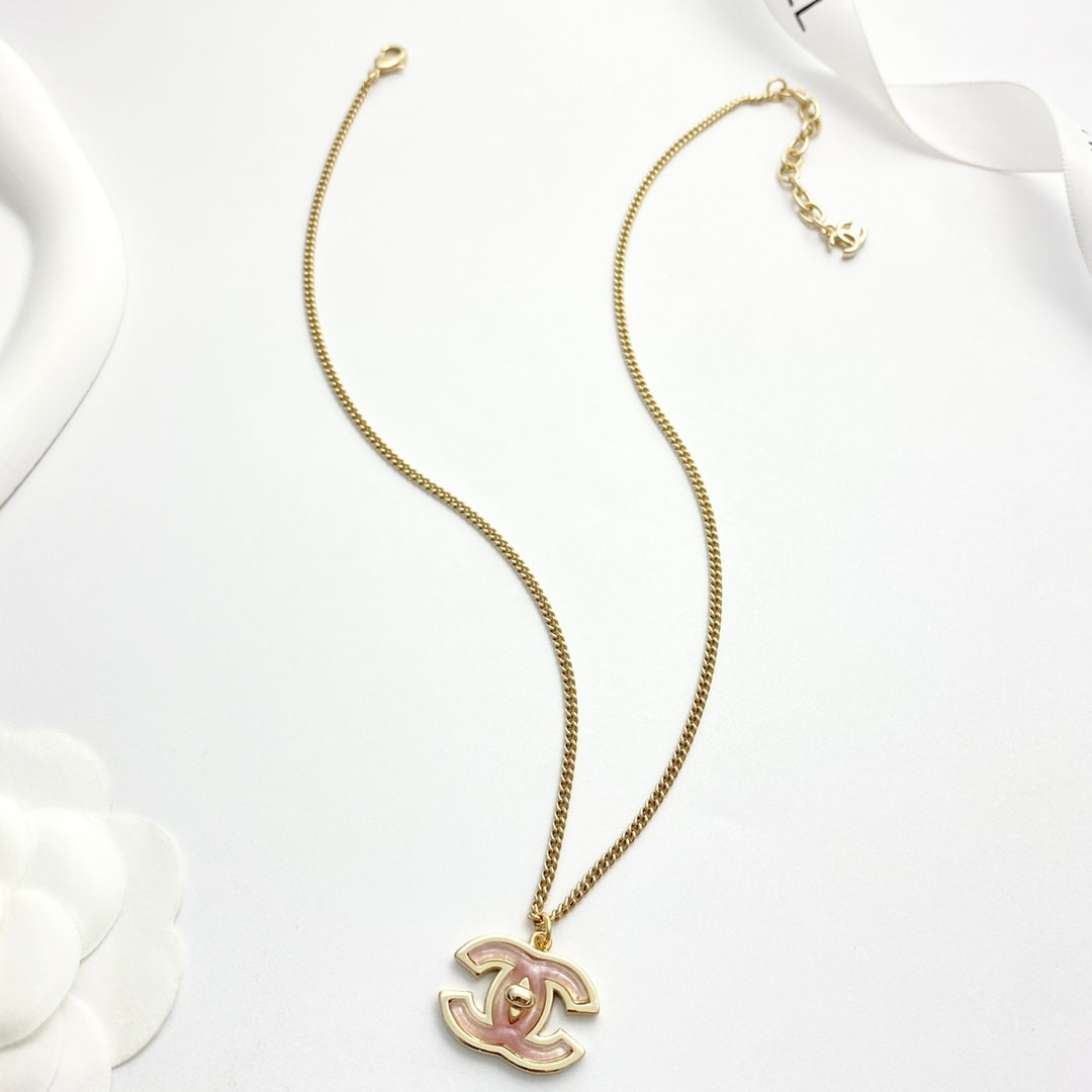 Signature Emblem Pendant Necklace in Gold-Tone – Pink Detail – Design 004 styled product view