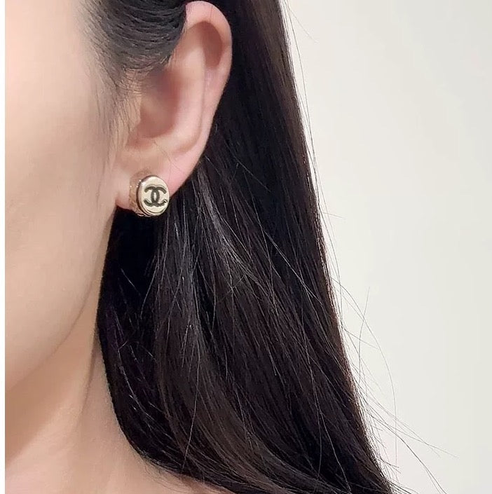 Signature Emblem Stud Earrings in Polished Metal-Tone – Pink Detail main product view