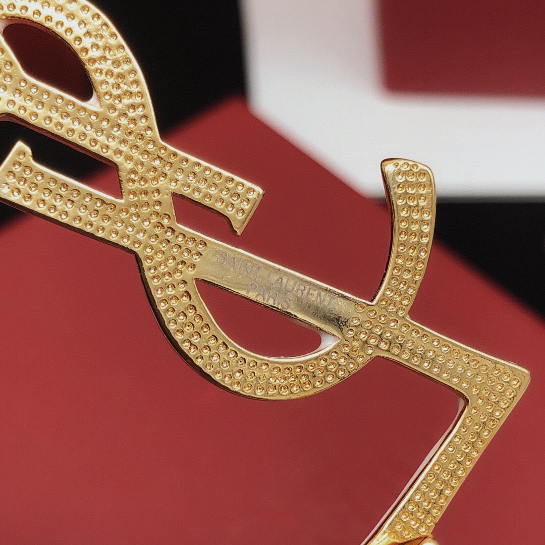 Geometric Emblem Brooch in Gold-Tone – White Detail styled product view