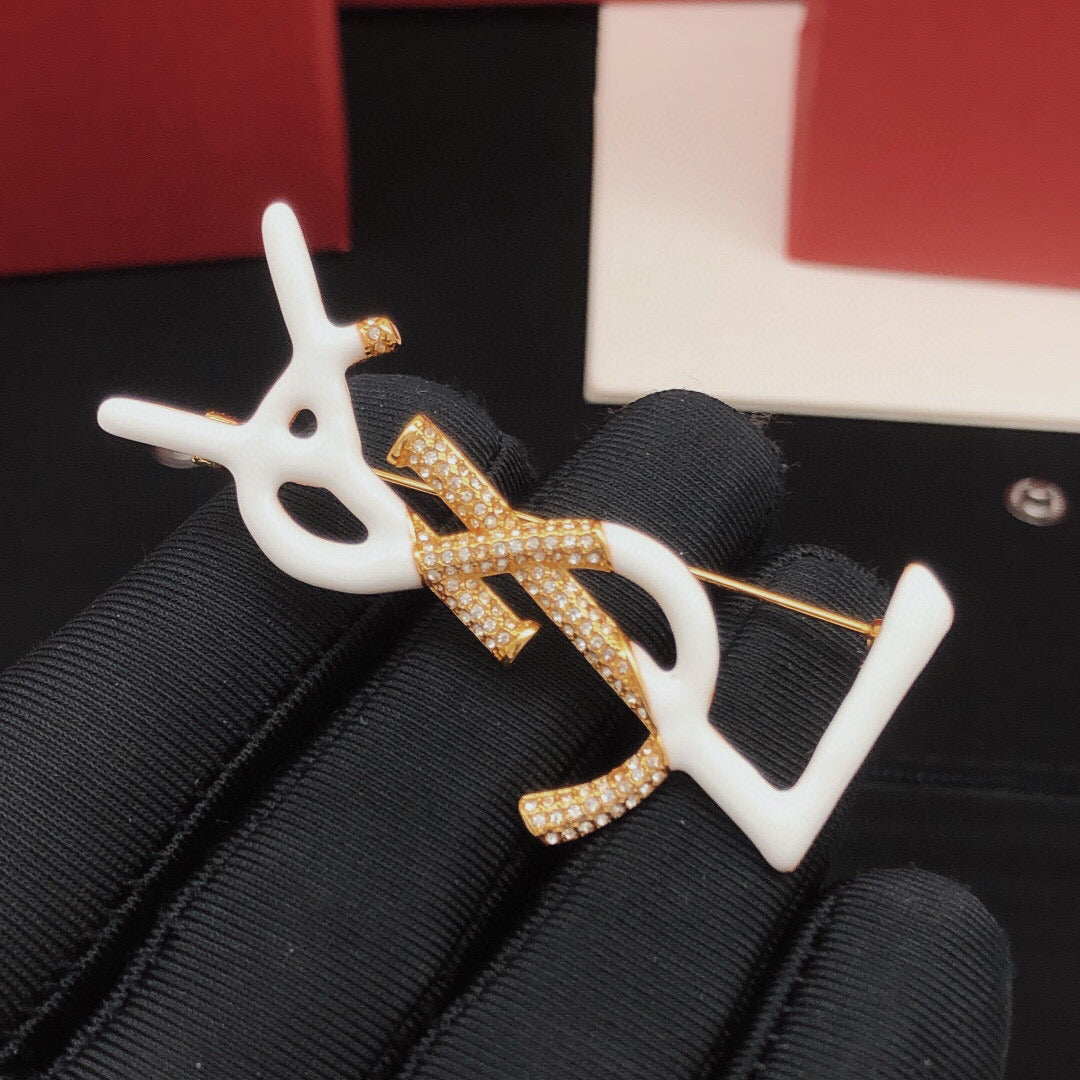 Geometric Emblem Brooch in Gold-Tone – White Detail main product view