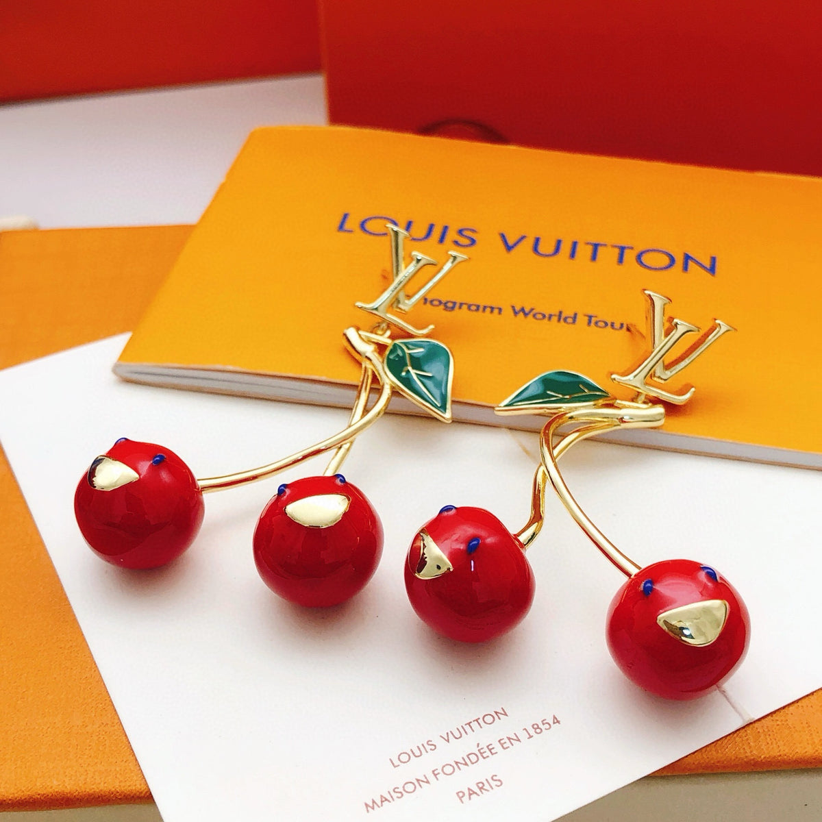 Geometric Emblem Stud Earrings in Gold-Tone – Red Detail detail view